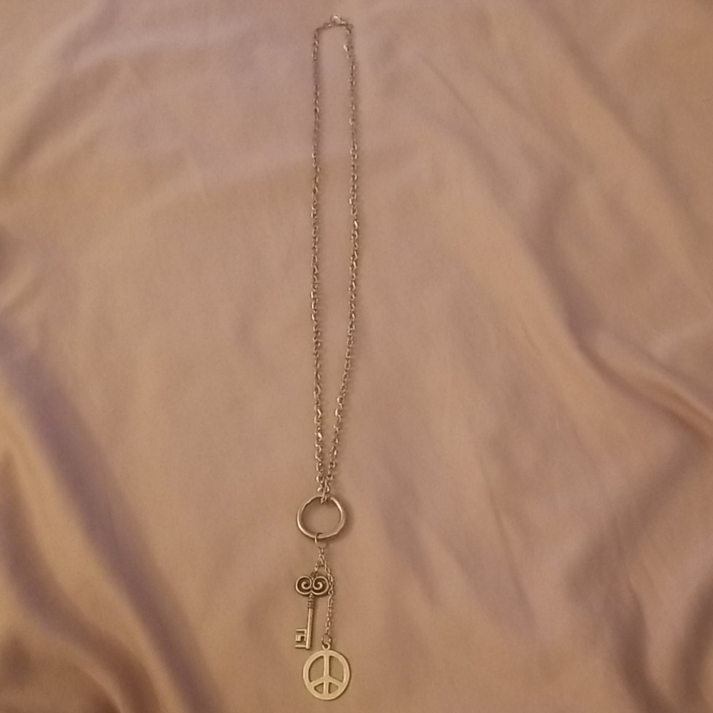Peace and Key necklace (costume jewelry)